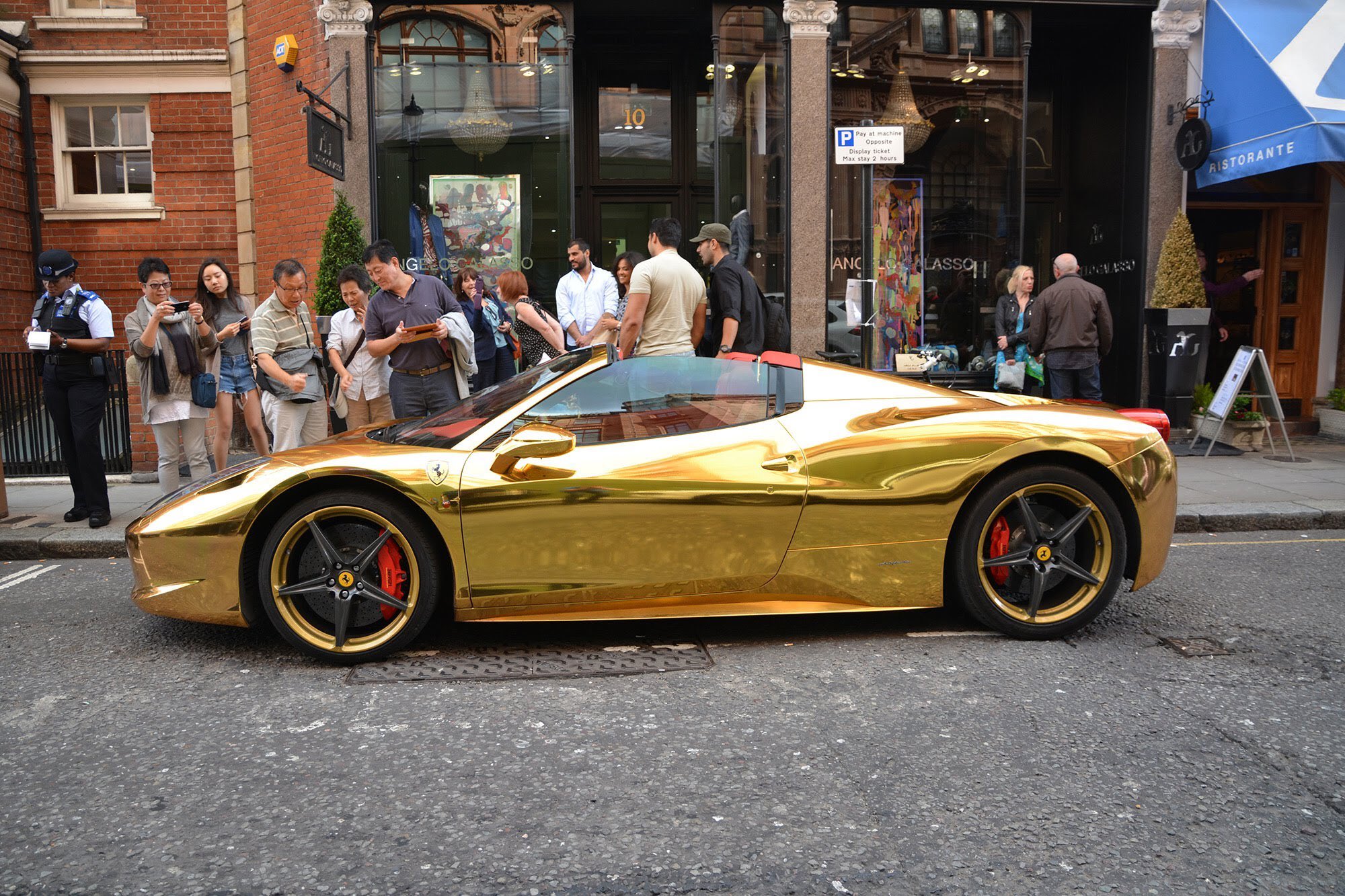 CLASS: Ronaldo Shakes Up the Streets of Arabia Behind the Wheel of a Gold-Plated Ferrari 488 GTB