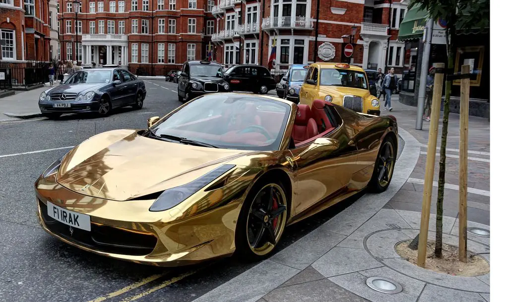 CLASS: Ronaldo Shakes Up the Streets of Arabia Behind the Wheel of a Gold-Plated Ferrari 488 GTB