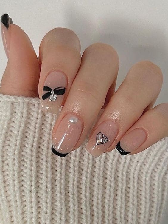 Korean black French tip nails: bow charm