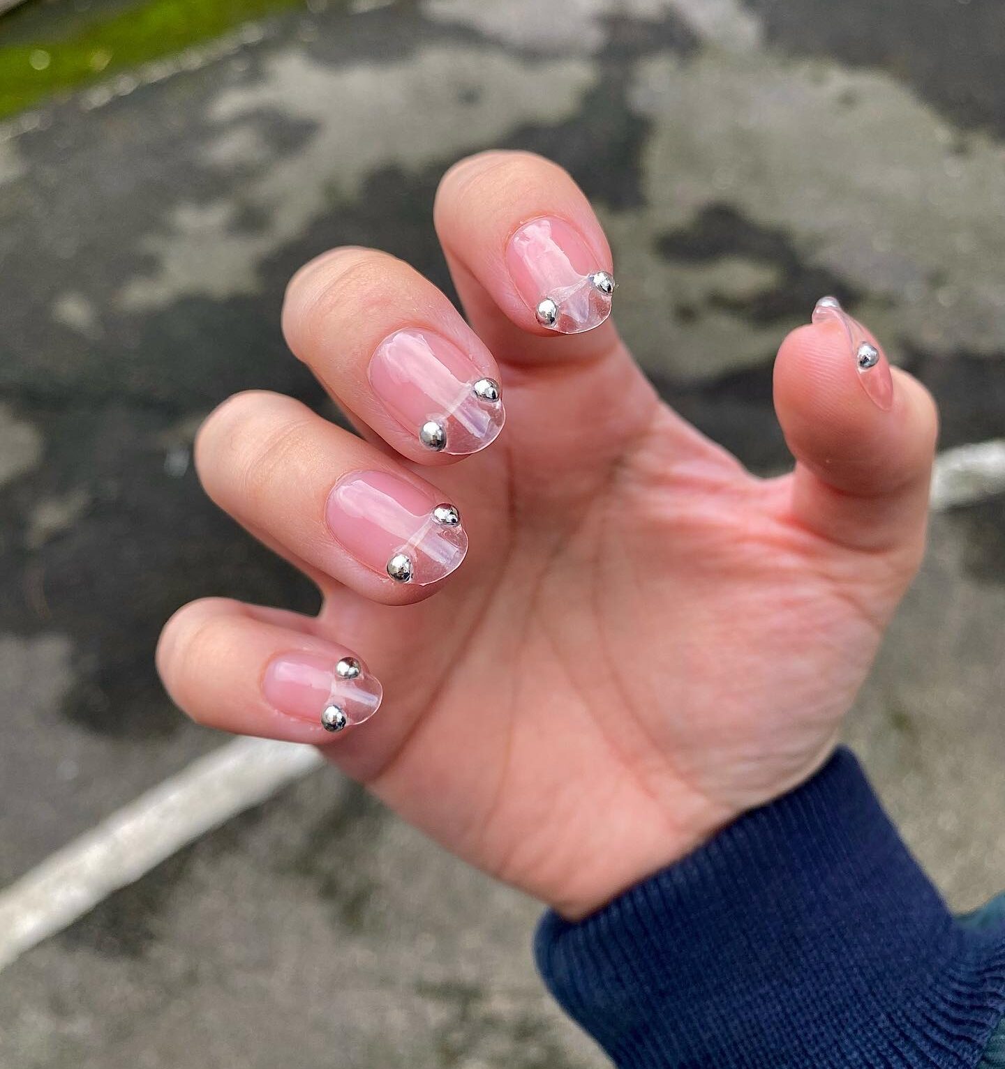 Medium round shaped clear nails with unique French tips