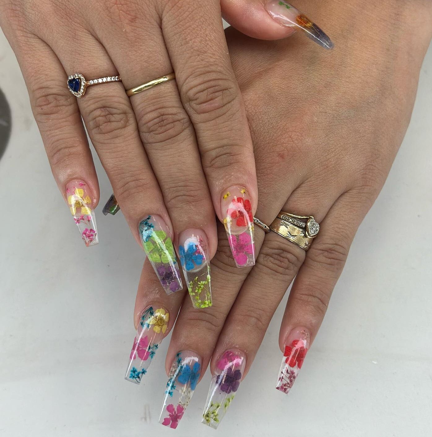 Long coffin clear nails with colorful flowers nail designs