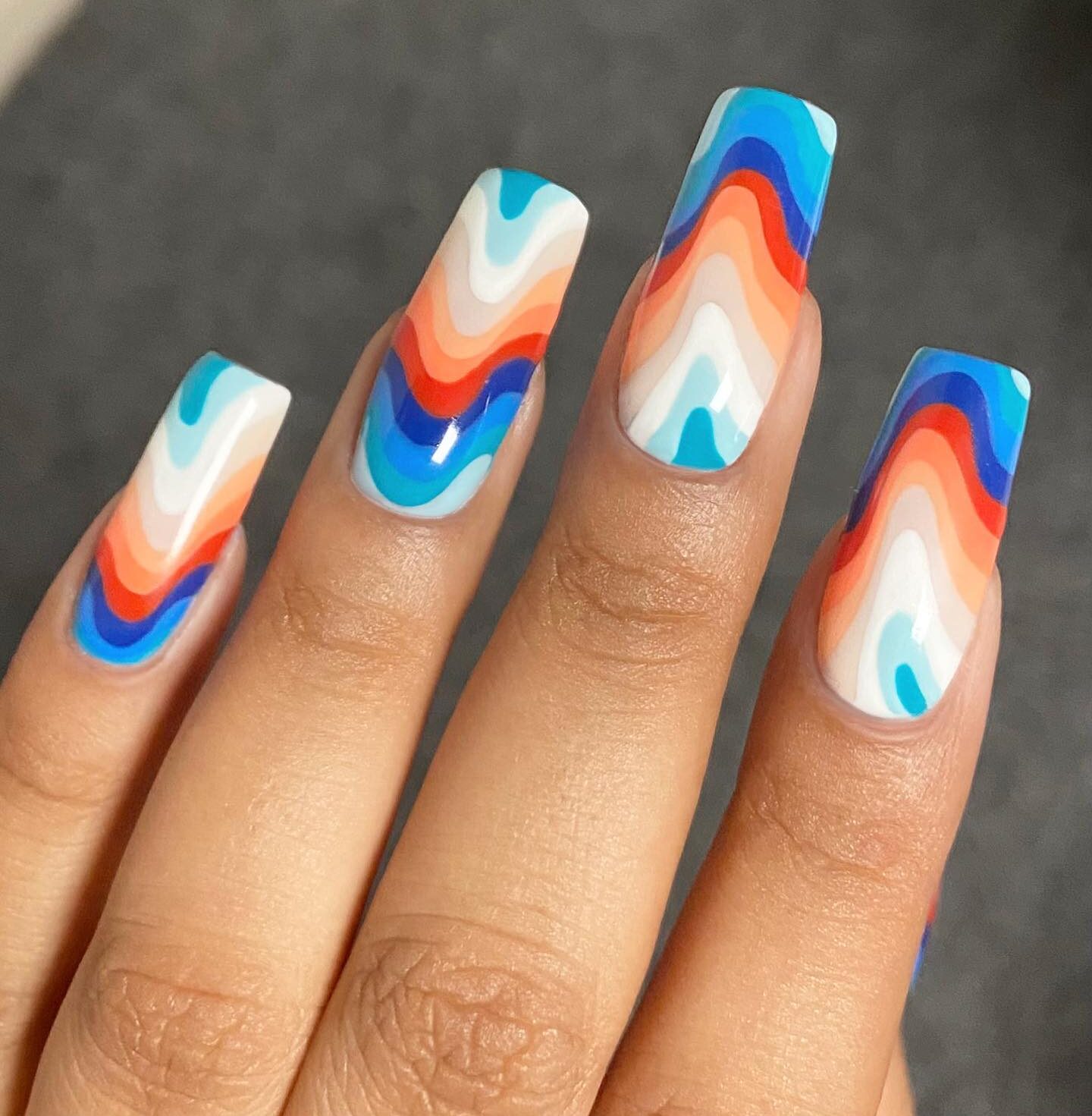 Multicolored swirls on long square nails