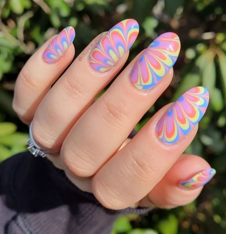 Pastel tie dye nail art on medium round nails