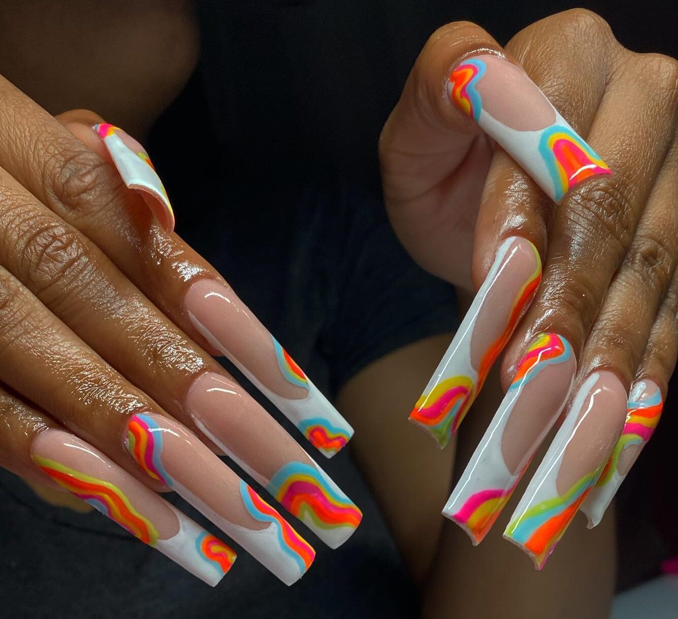 White French tips with colorful swirls on super long square nails