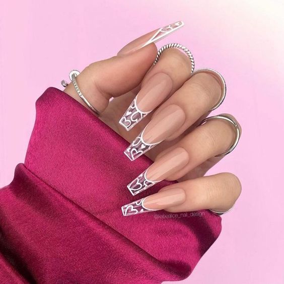 Heart design French tips on long coffin nails