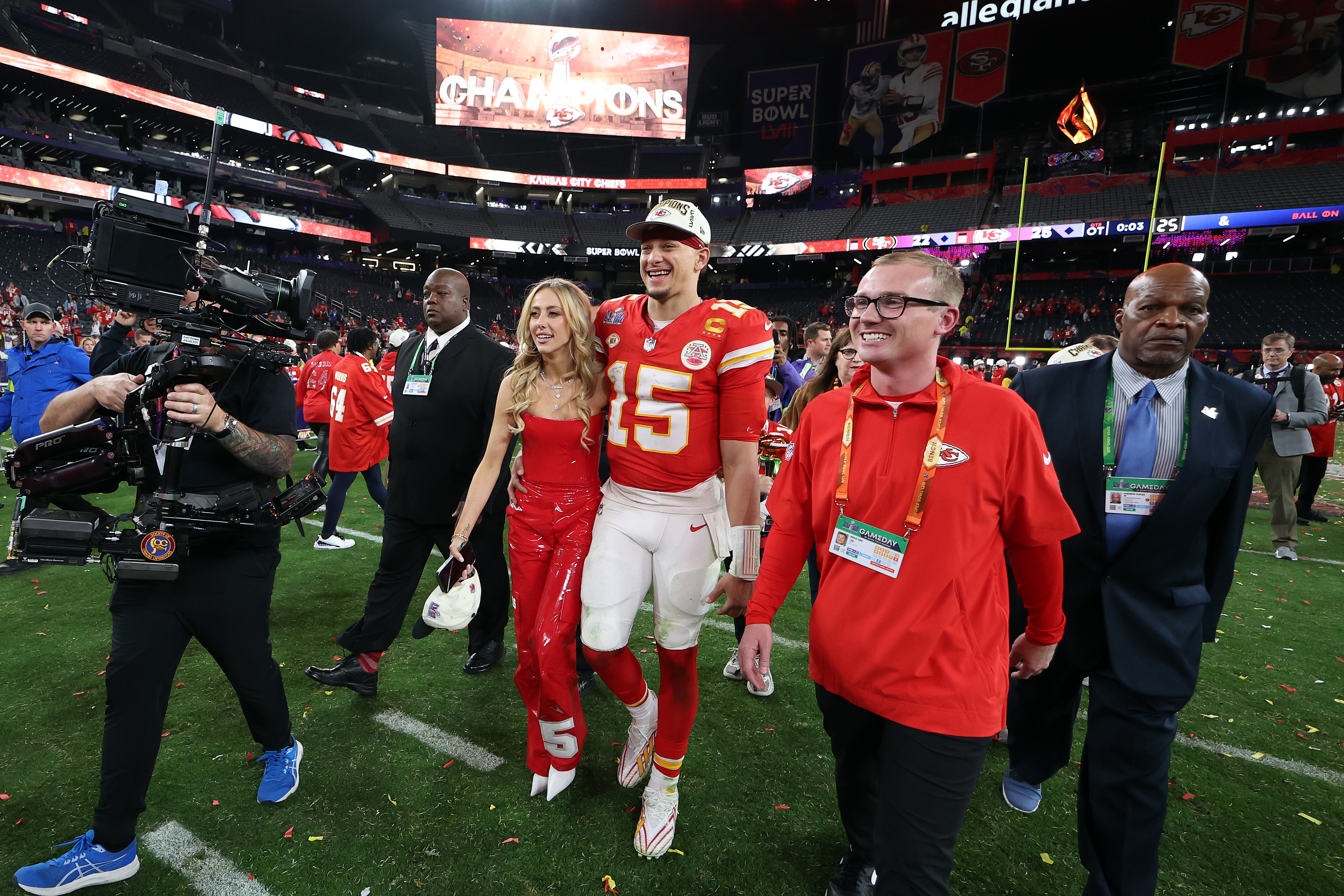 Brittany Mahomes sports diamond football necklace at Kansas City Chiefs Super  Bowl parade