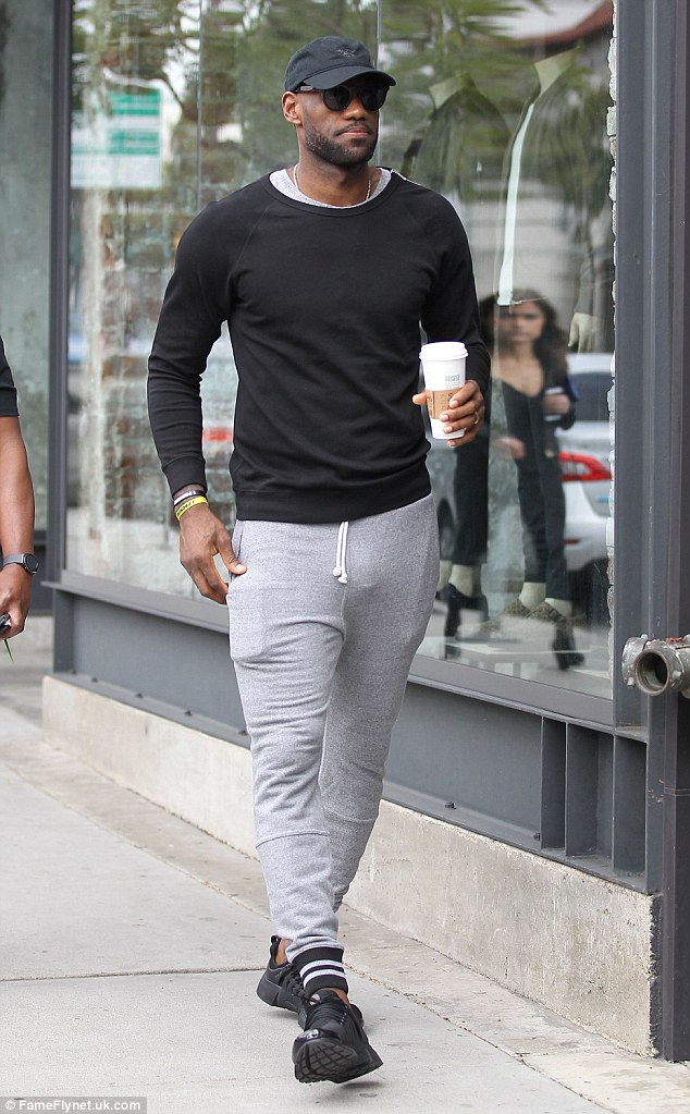 NBA star LeBron James looked casual in tight pants while walking around drinking gentle chilled coffee