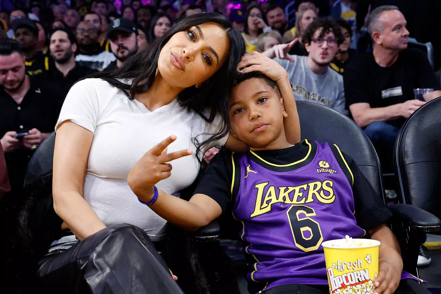 Kim Kardashian and Saint West attend a basketball game between the Los Angeles Lakers and Golden State Warriors at Crypto.com Arena on March 16, 2024 in Los Angeles, California.