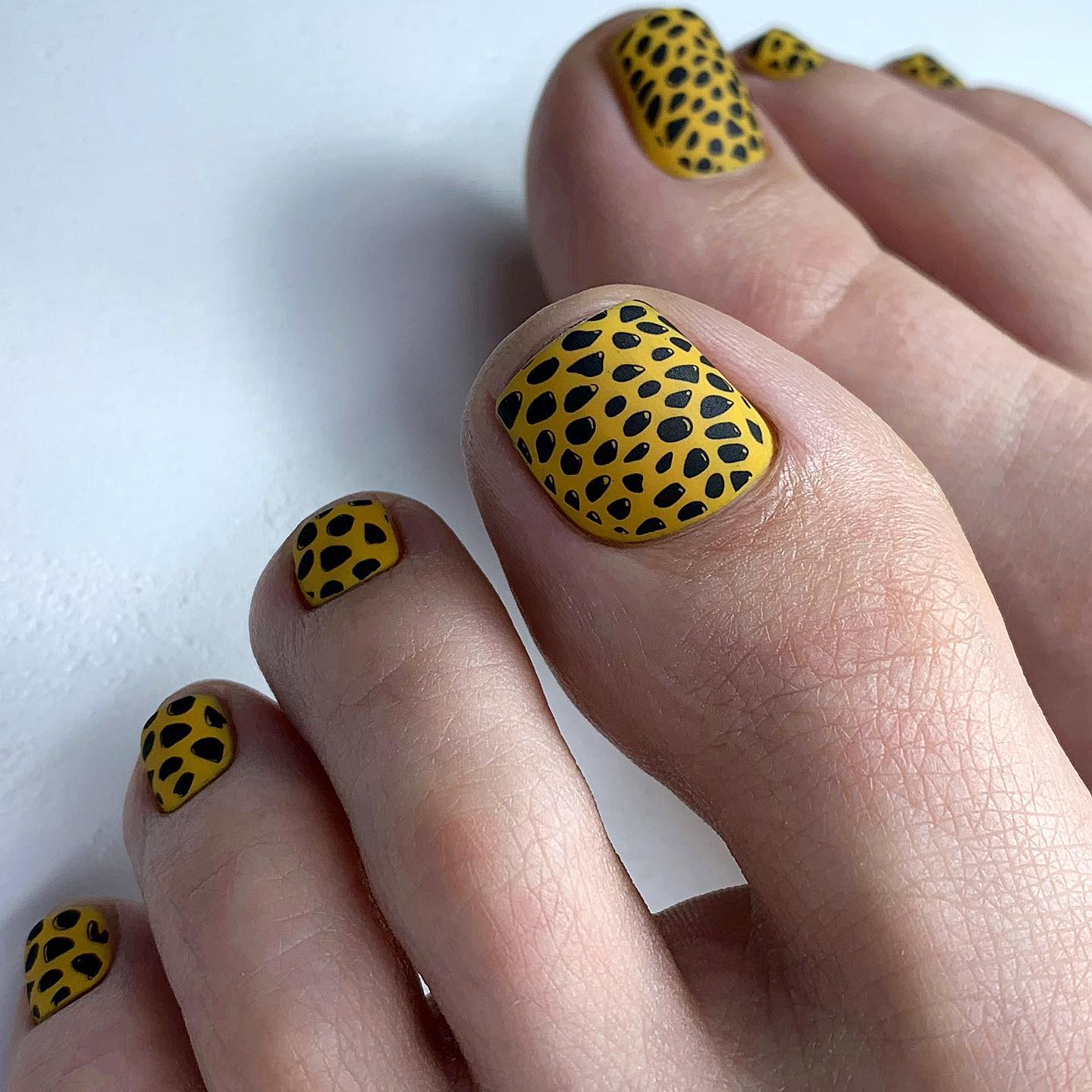 Matte Yellow Pedicure with Black Spots