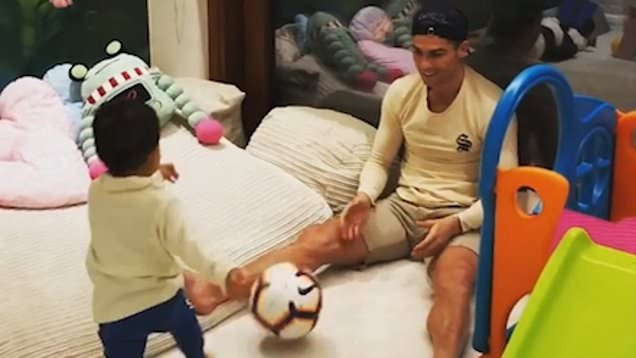 Cristiano Ronaldo's toddler son Mateo follows in his footsteps as he  teaches him football skills | Daily Mail Online