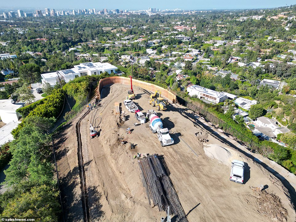 Another angle of the property shows the sheer size of the project, with many builders already working on the build