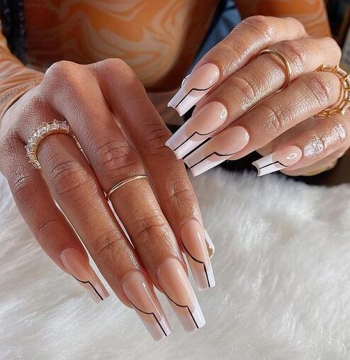 White French tips with black lines on long square nails