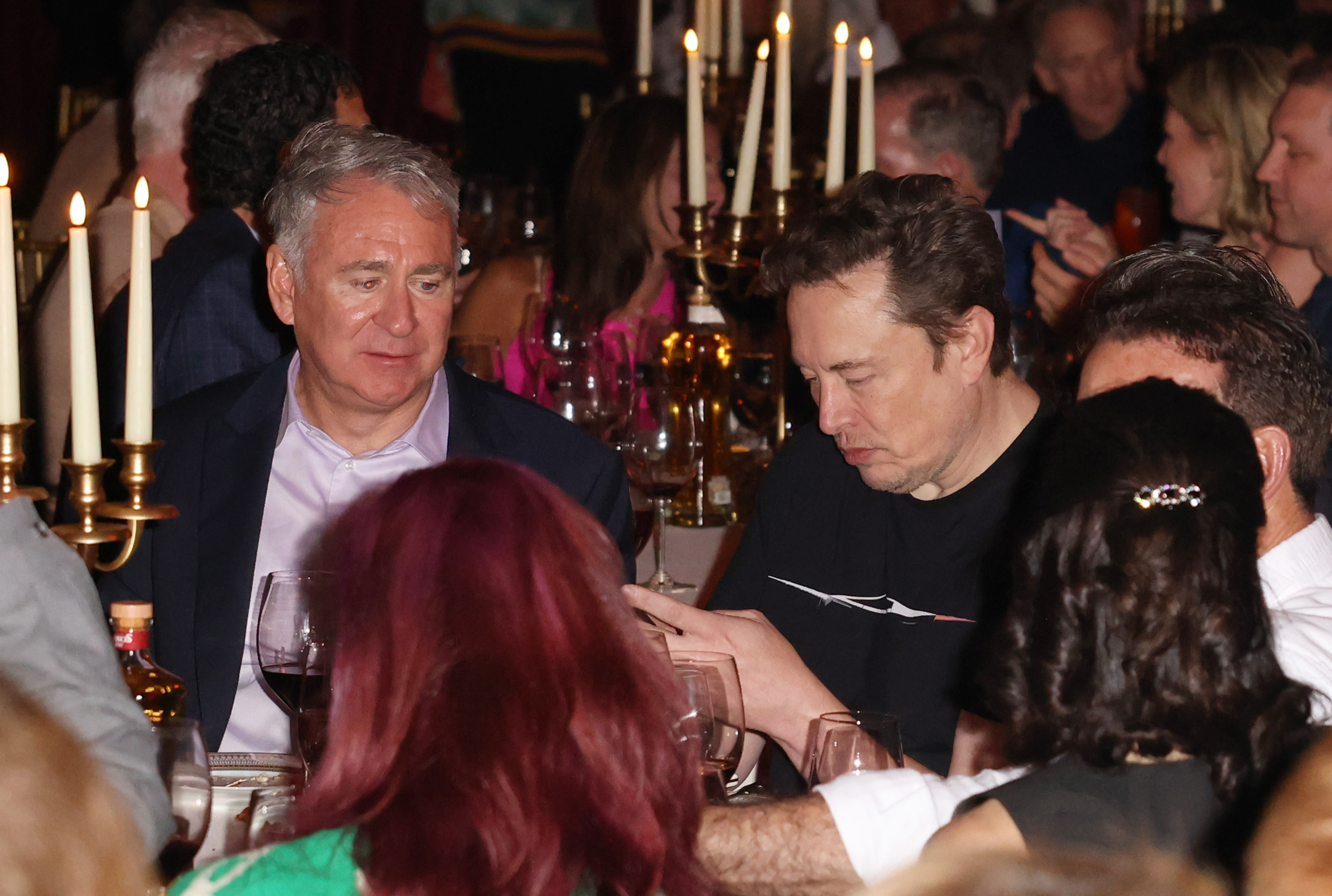 Ken Griffin and Elon Musk at Carbone Beach.