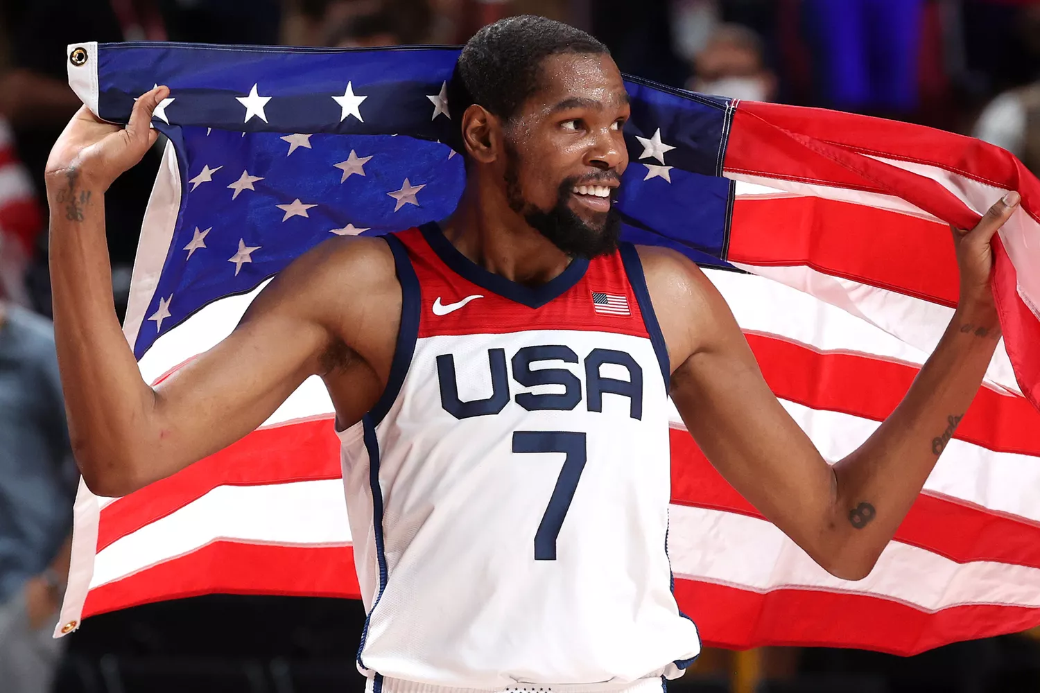 Kevin Durant #7 of Team United States celebrates following the United States' victory over France in the Men's Basketball Finals game on day fifteen of the Tokyo 2020 Olympic Games at Saitama Super Arena on August 07, 2021 in Saitama, Japan.