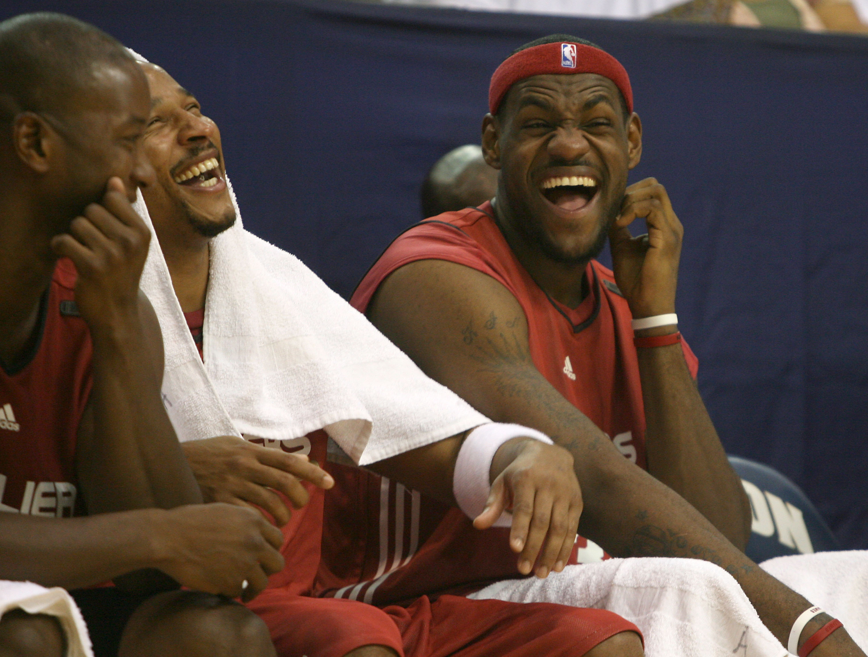 DAILY FEATURE ONE OF SOME-- Cavaliers star LeBron James laughs with David Wesley and Eric Snow on the Wine Bench during a scrimmige at James A Rhodes Arena in Akron. Shot Saturday October 8, 2006.  (Brynne Shaw/The Plain Dealer)