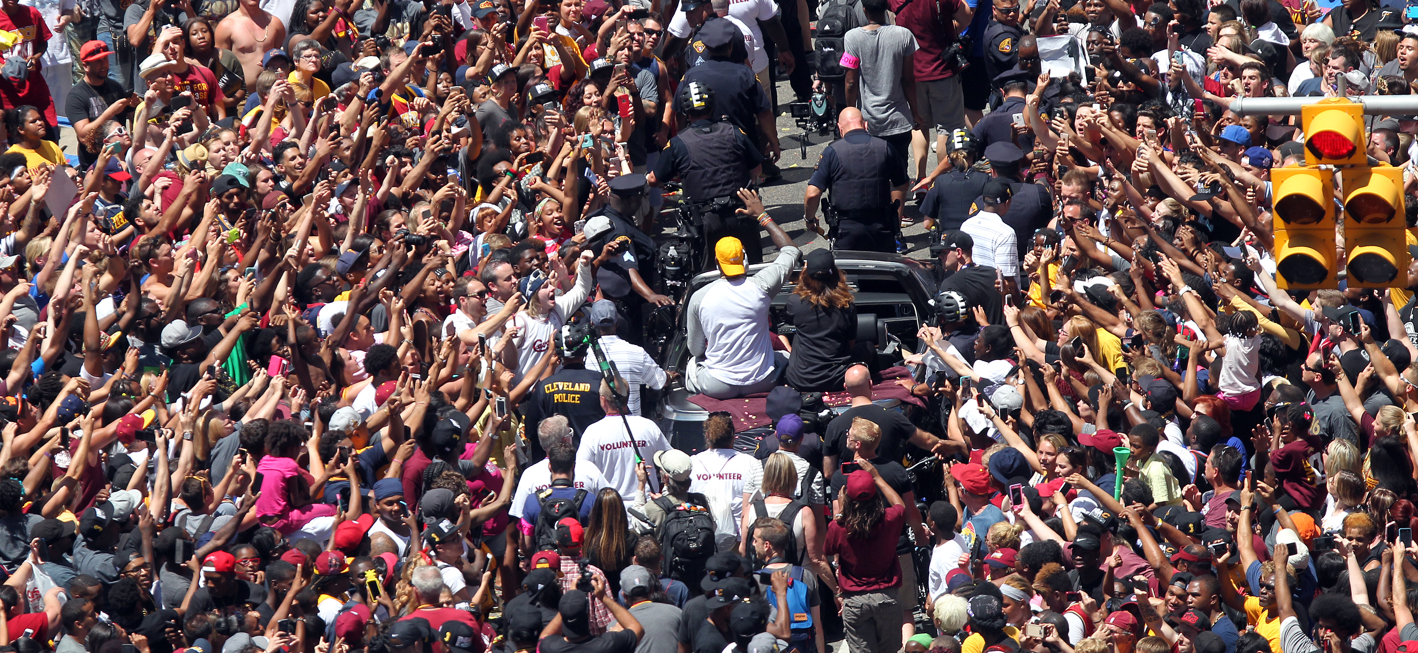 Cleveland Cavaliers forward LeBron James  waves to fans during a parade in downtown Cleveland to celebrate and honor the 2016 NBA Champion Cleveland Cavaliers.    Joshua Gunter, cleveland.com June 20, 2016. Cleveland.