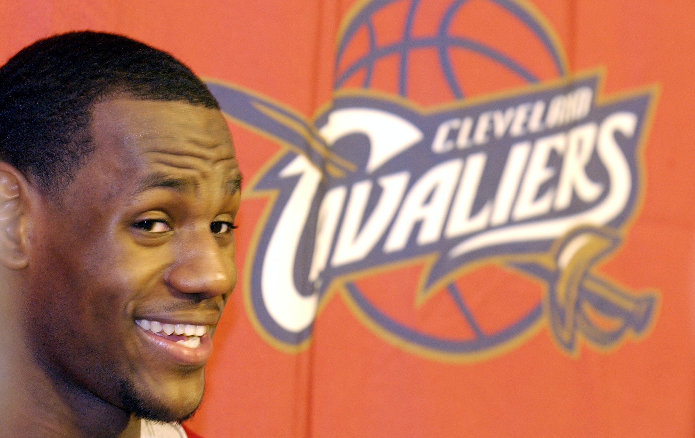 The bulk of the Cavaliers team was on hand for the first practice. LeBron James fields questions from a swarm of media personel attending the practice at Gund Arena.(Roadell Hickman/The Plain Dealer)