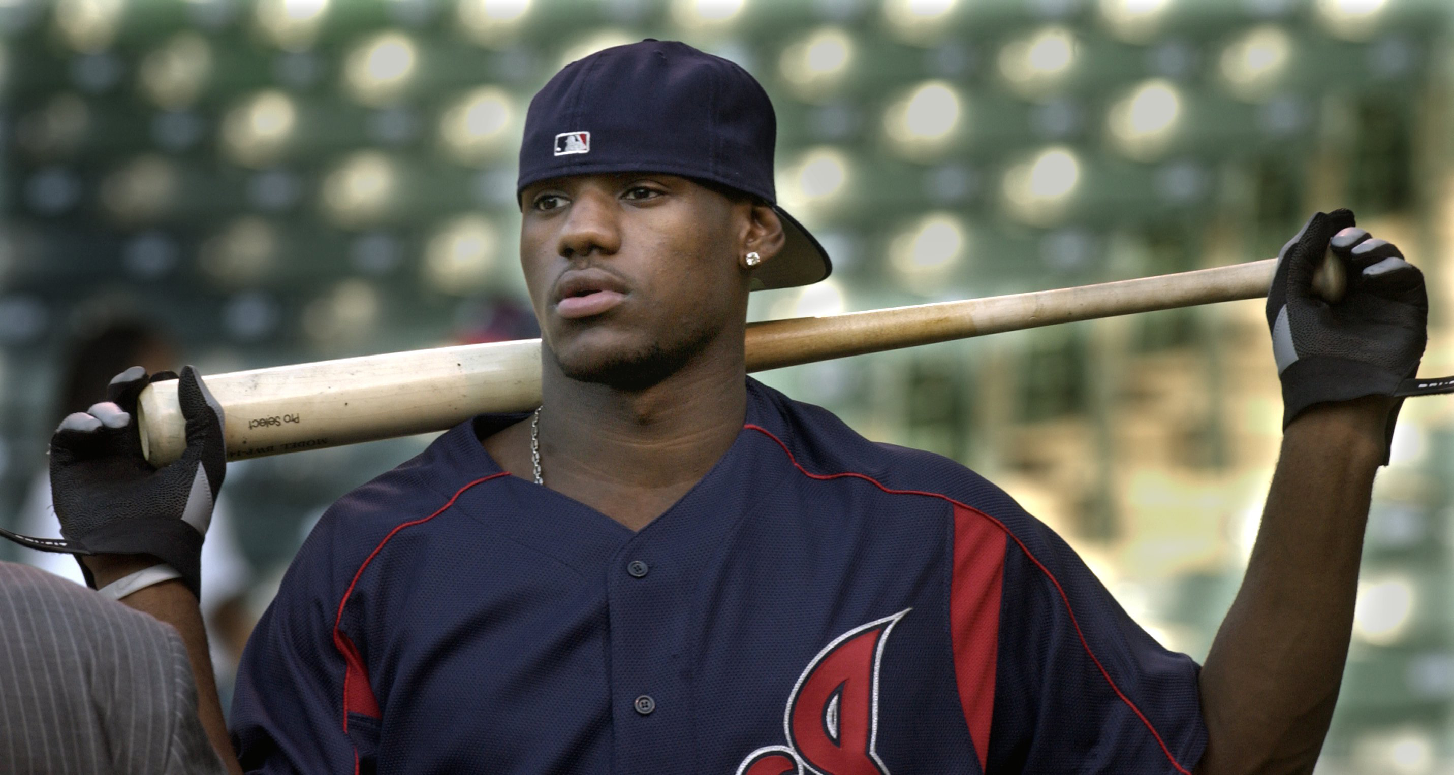 LeBron James, the Cavs #1 pick this year, gets ready to hit batting practice before the Cincinnati Reds-Cleveland Indians game on Friday night.  Shot at Jacobs Field.  Shot on June 27, 2003.  (Chuck Crow/The Plain Dealer)