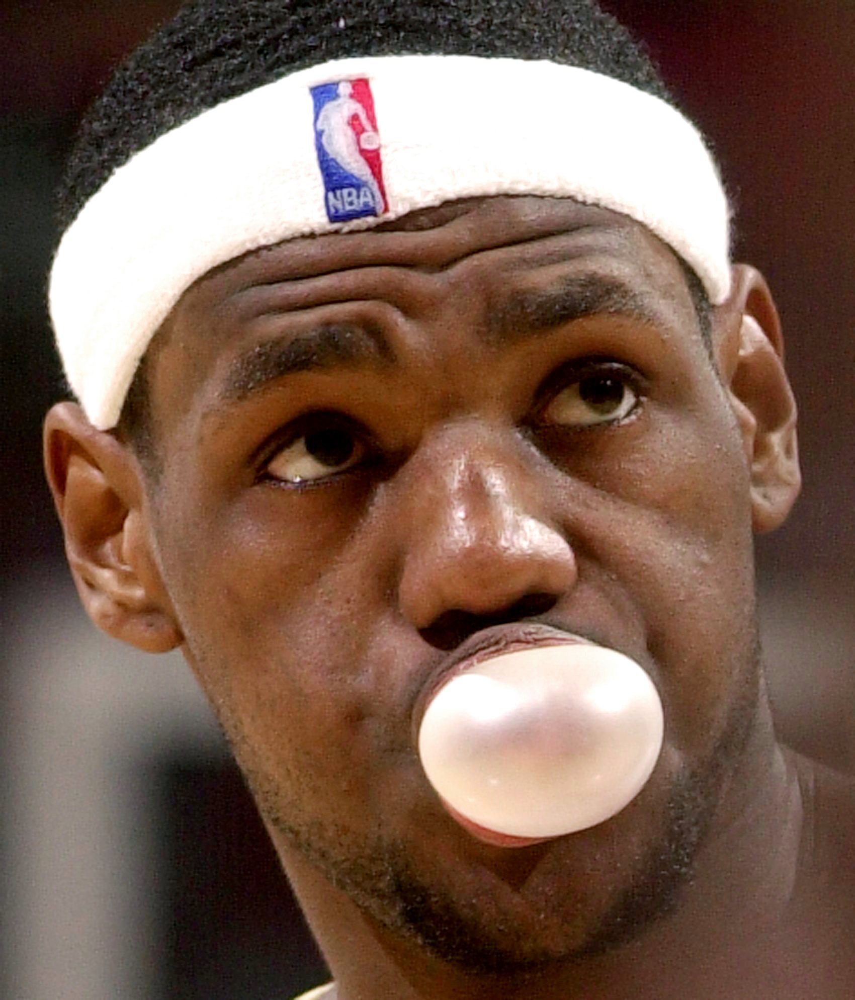 Cleveland Cavaliers LeBron James blows a bubble during game against the Milwaukee Bucks April 12, 2004  at Gund Arena.      (John Kuntz/The Plain Dealer)