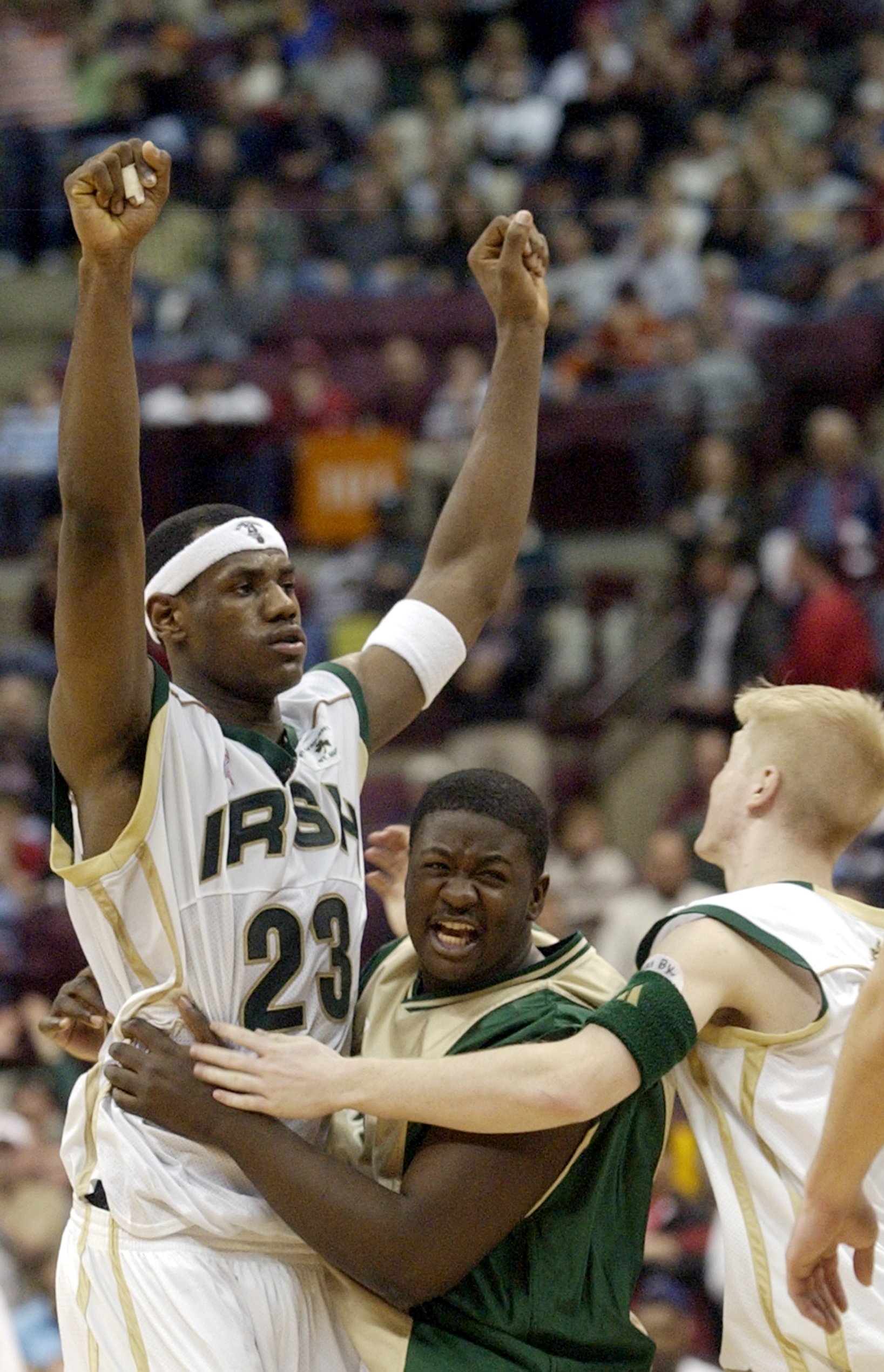 St. Vincent-St. Mary players LeBron James(left) and Marcus Allen celebrate midcourt as they defeat Archbishop Alter at Value City Arena. (Roadell Hickman/The Plain Dealer)