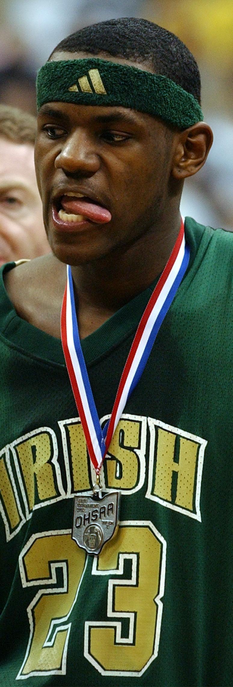 March 23, 2002 Columbus, OH. Value City Arena.....LeBron James of St. Vincent St. Mary receives the second place OHSAA medal during team trophy ceremonies held midcourt at Value City Arena.(Roadell Hickman/The Plain Dealer)