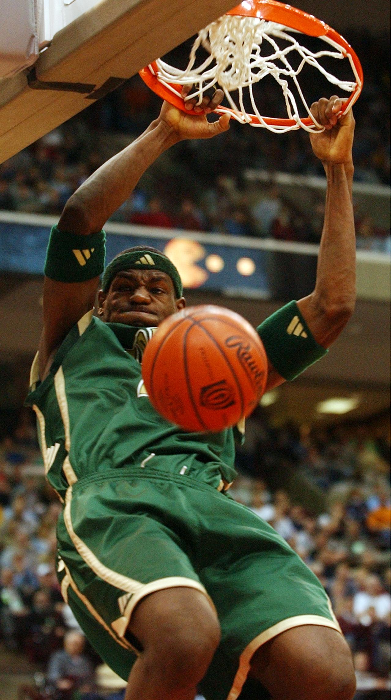 LeBron James of St. Vincent St.Mary dunks for two points in the 4th period of play. St. Vincent St. Mary took runner-up to Roger Bacon High in the state basketball tournament at Value City Arena. (Roadell Hickman/The Plain Dealer)