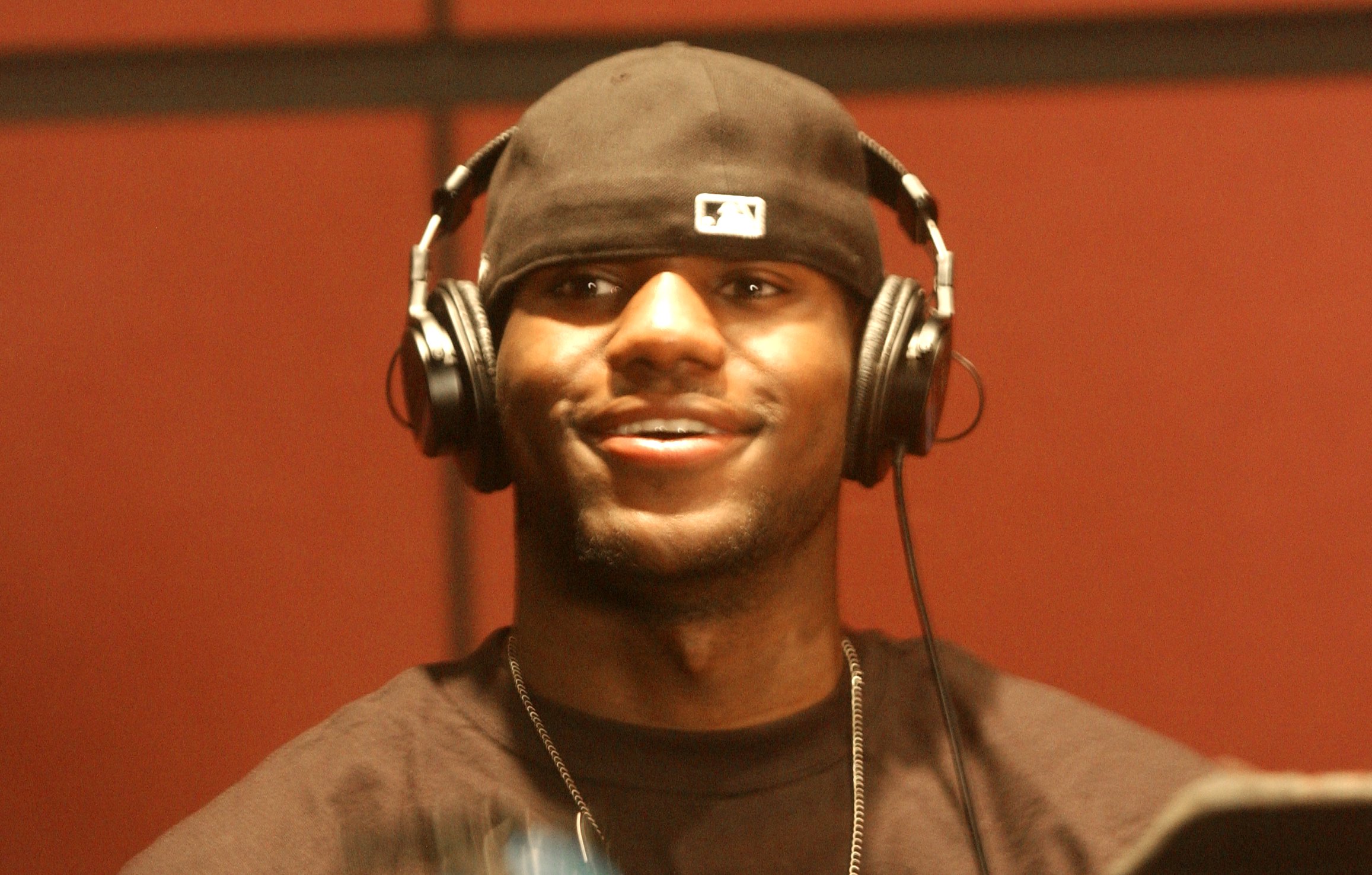 Cleveland Cavaliers 1st round draft pick, LeBron James, wears a set if headphones while taping a radio ad for the upcoming basketball season Thursday, Sept. 4, 2003, Independence, Ohio.  (Dale Omori/The Plain Dealer)