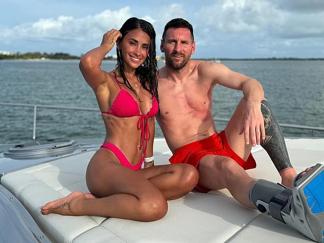 Lionel Messi donned his protective boot while relaxing with wife Antonela Roccuzzo on a Miami boat trip at the weekend