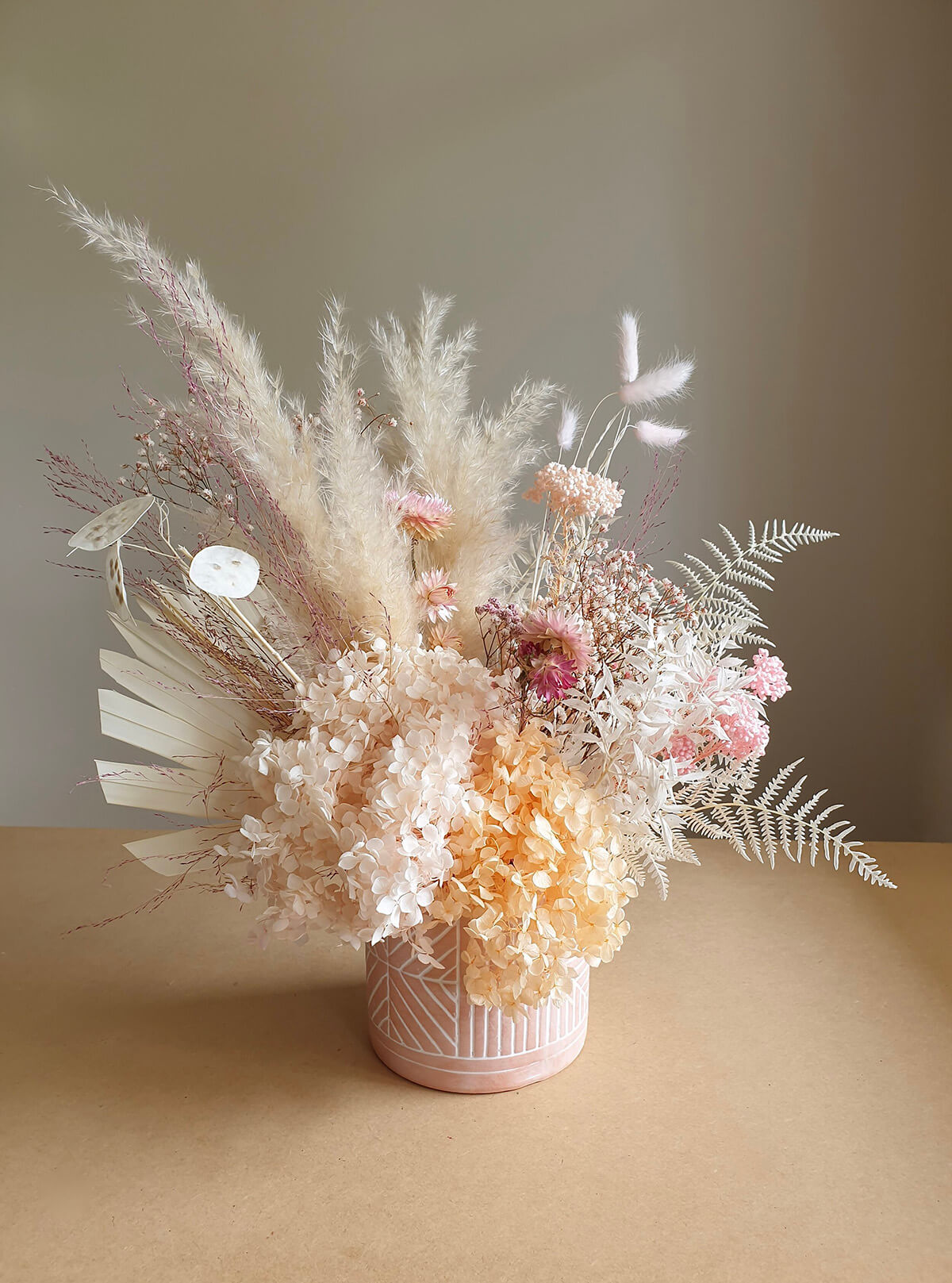 Pale Pink and Orange Floral Arrangement